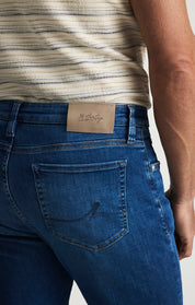 Courage Tapered Leg Jeans In Dark Brushed Organic Ultra