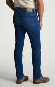 Courage Tapered Leg Jeans In Dark Brushed Organic Ultra